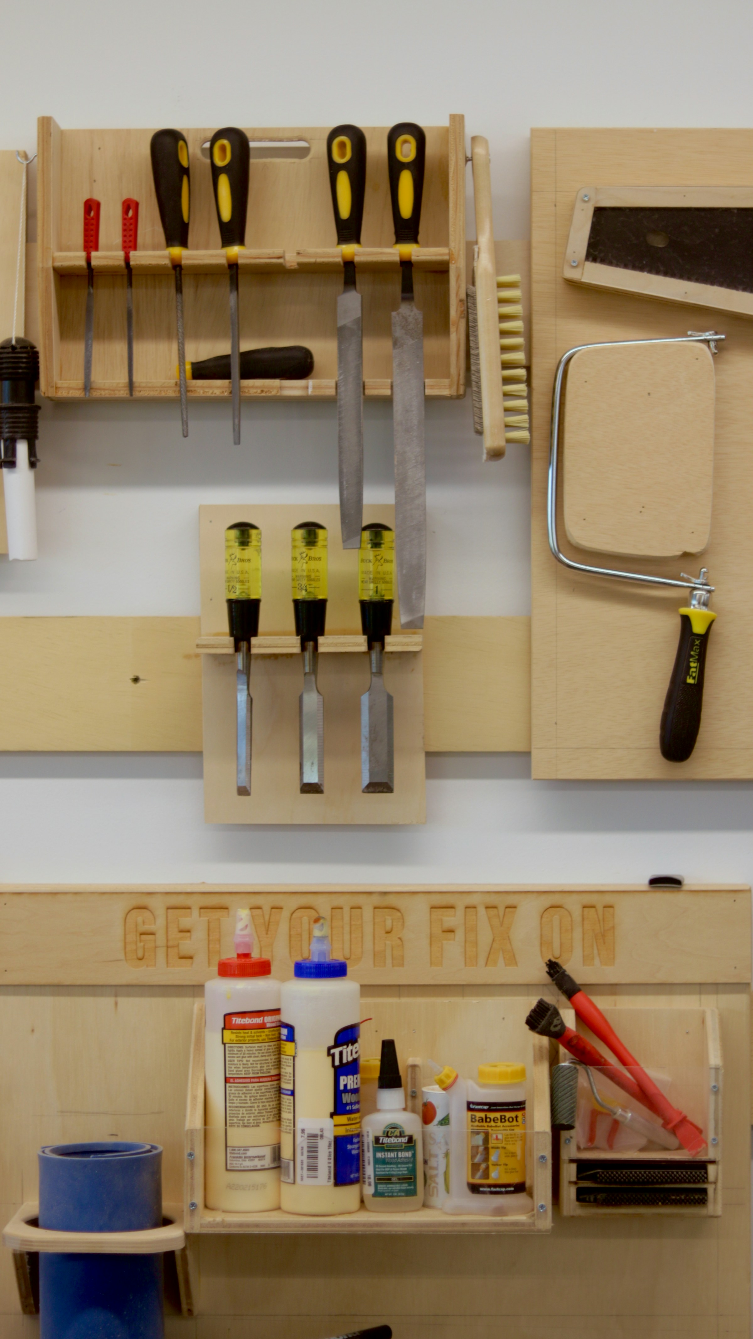 Woodworking tools arranged at a craft workbench
